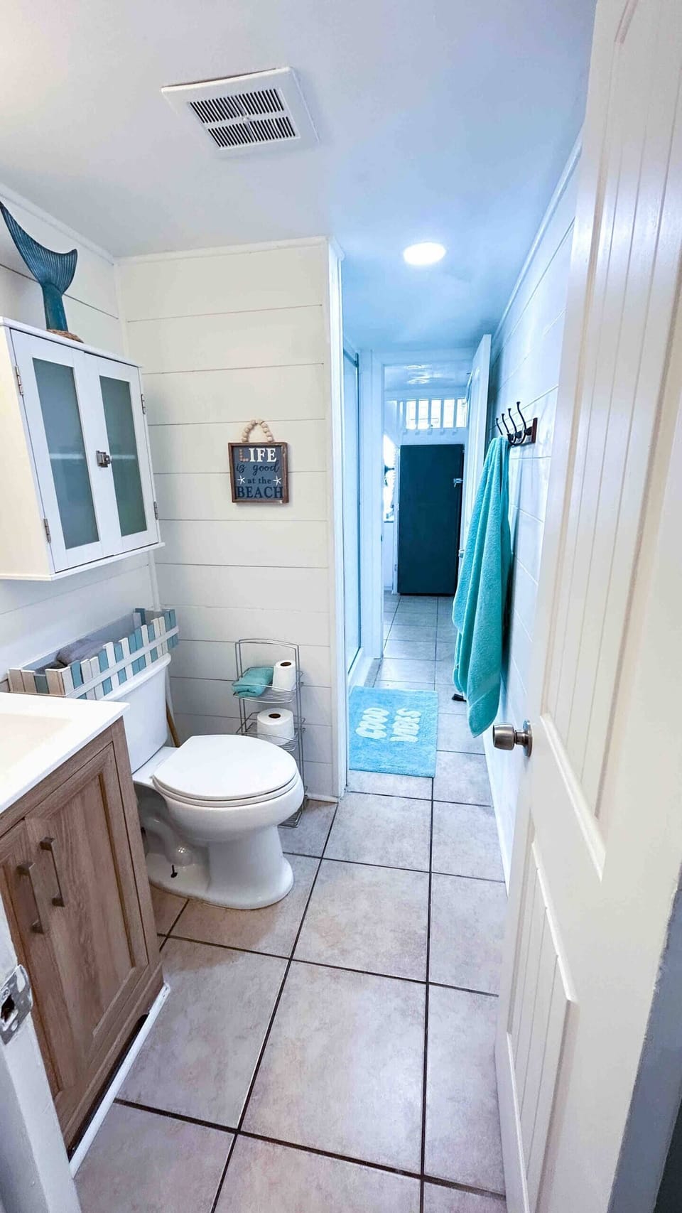 Bathroom with walk in shower.