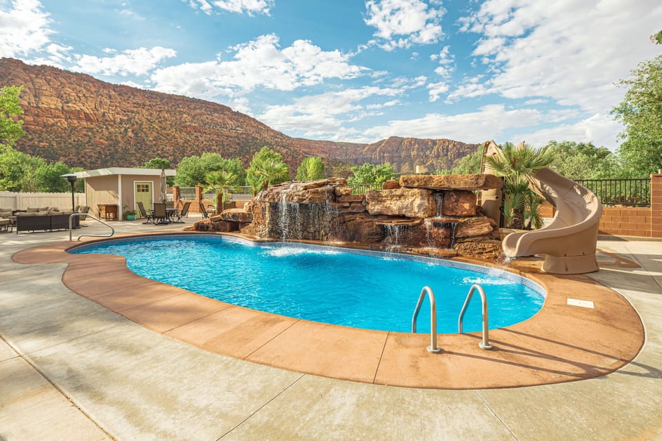 Pool w/ rock waterfall & slide- need we say more?! Option to heat (see listing)