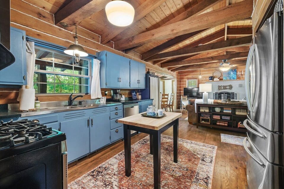 Our open concept living space keeps conversation flowing between the kitchen, dining, and living rooms.