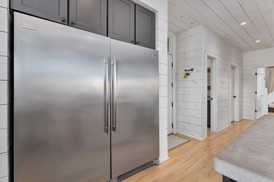 Enormous fridge and freezer to store food for the family