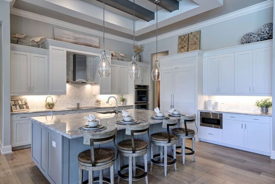 A stunning white kitchen is the perfect backdrop for all gatherings