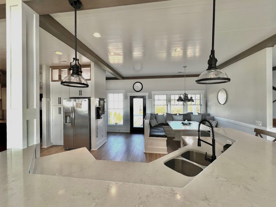 Kitchen with outdoor grilling deck