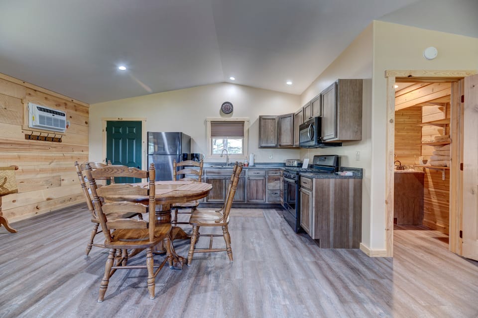 Kitchen with stainless steel appliances, full oven and fridge
