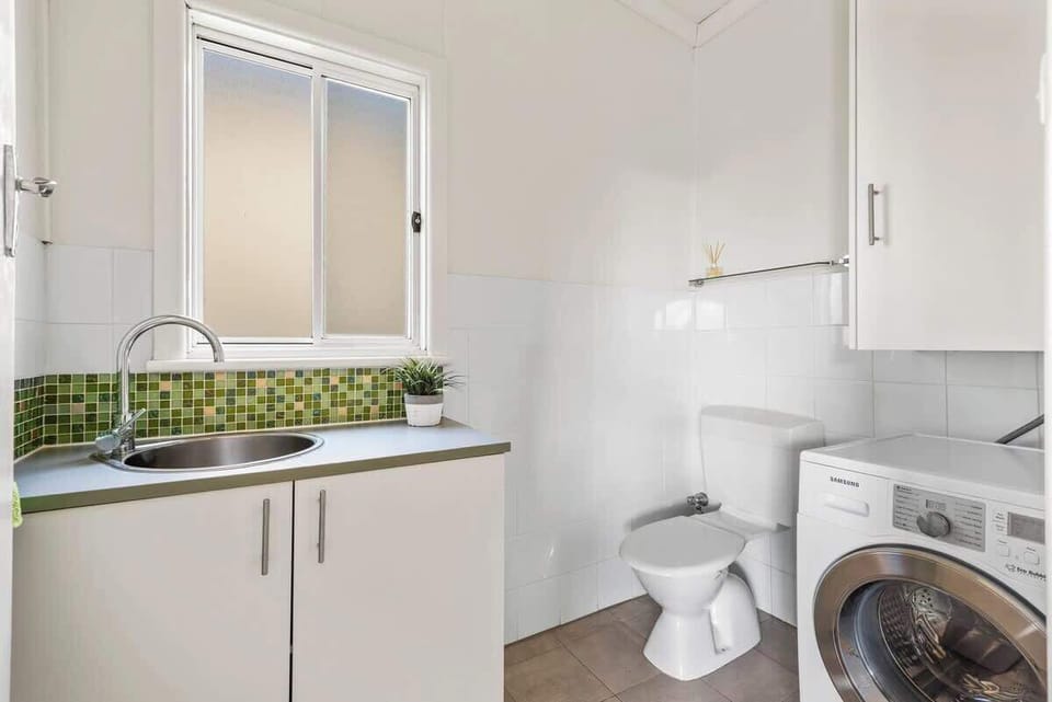 Laundry with a combined washer/dryer.