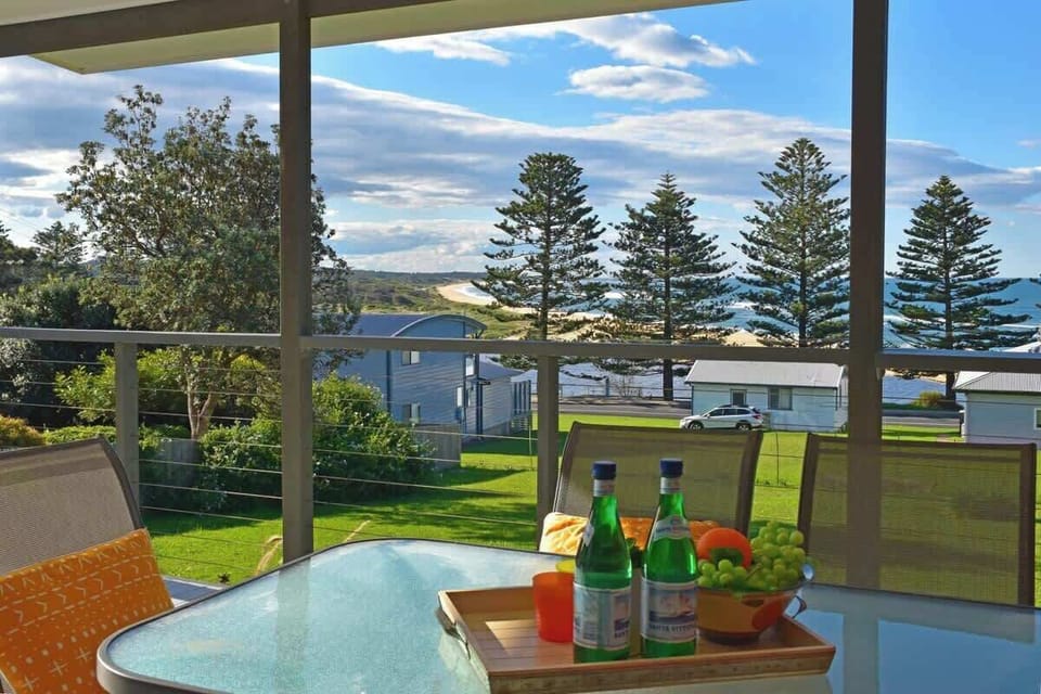 Enjoy lunch with the beach and ocean views! Electric outdoor BBQ and furnishings available.