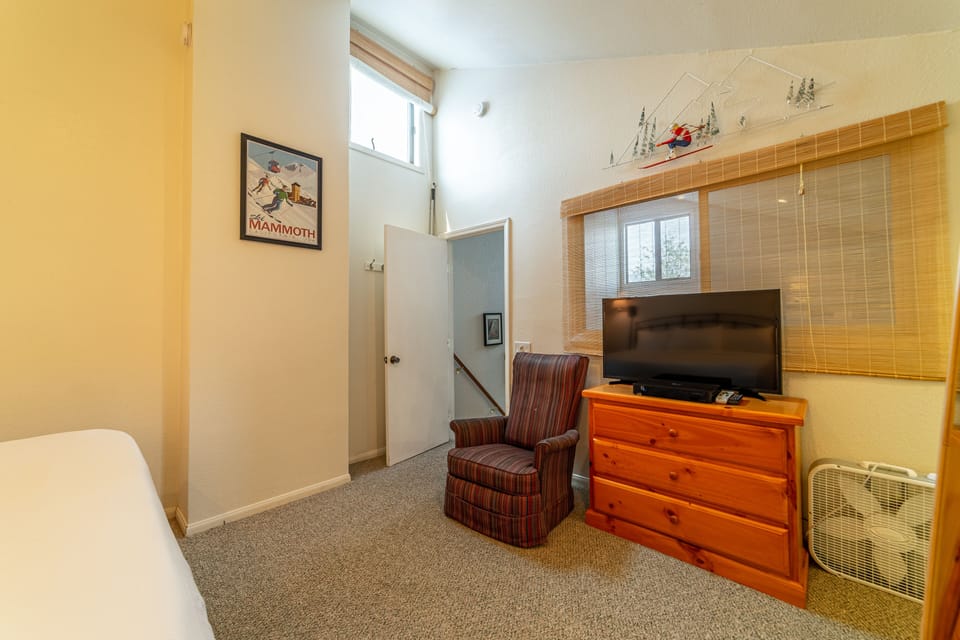 Primary Bedroom with dresser space and sitting area.