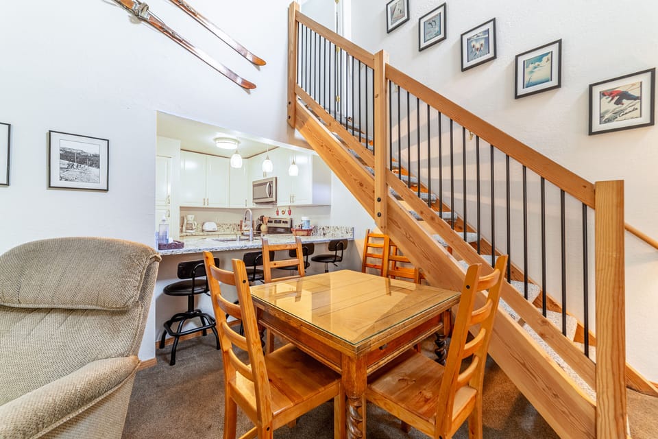 Dining table and bar seating with seating for 8.