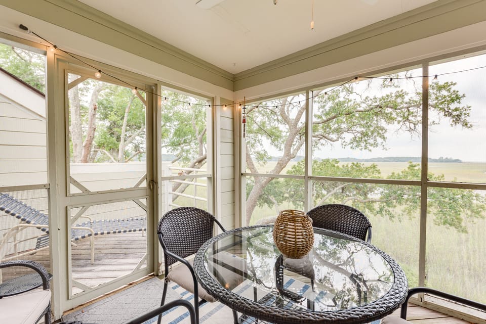 Door off the screen porch leads out to the back deck
