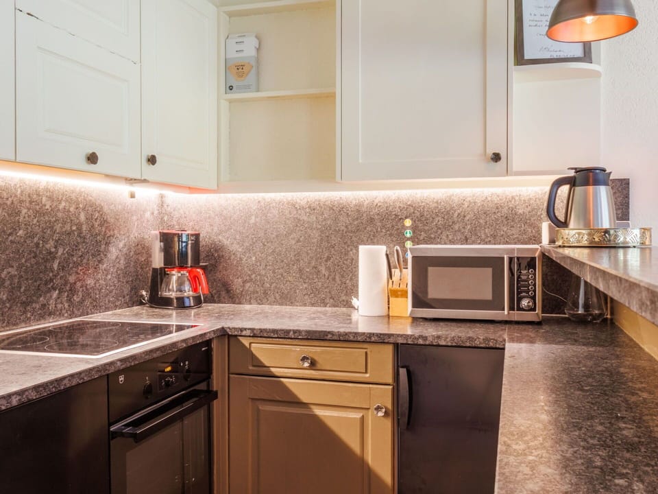 Kitchen, Countertop, Kitchen Appliance, Major Appliance, Interior Design, Cabinetry, Flooring, Lighting, Home, Kitchen Stove