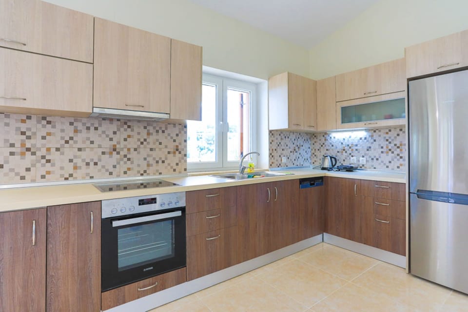 Smooth and sleek fully equipped modern kitchen