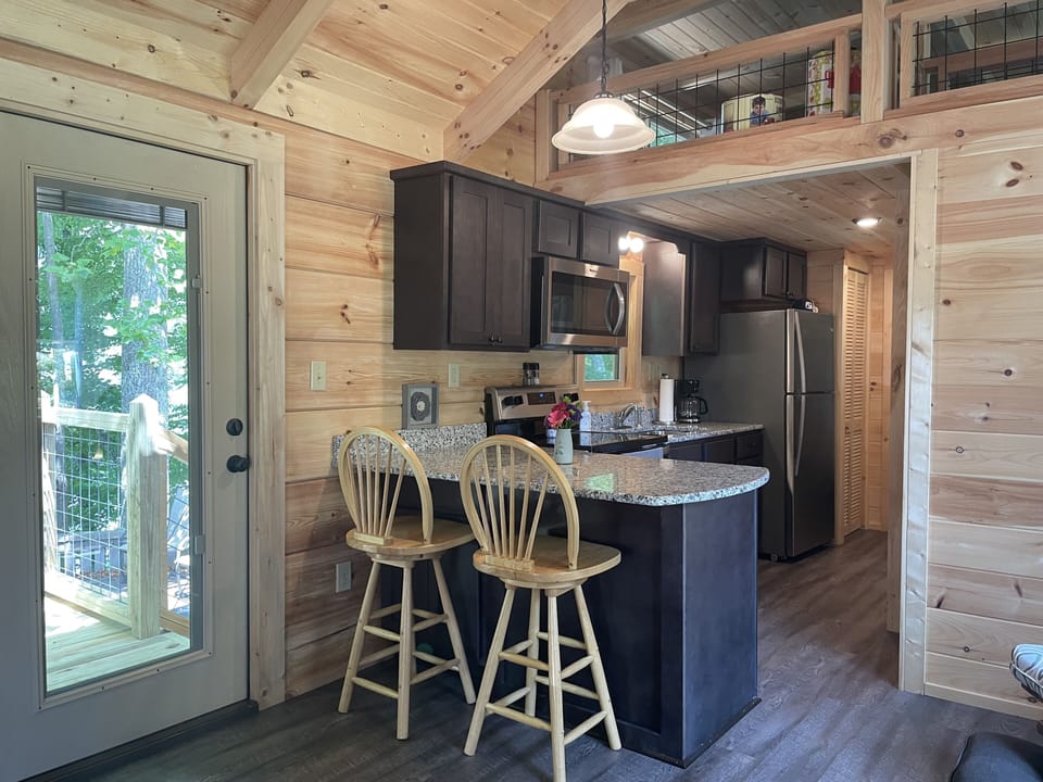 Kitchen with full-size appliances and granite countertops