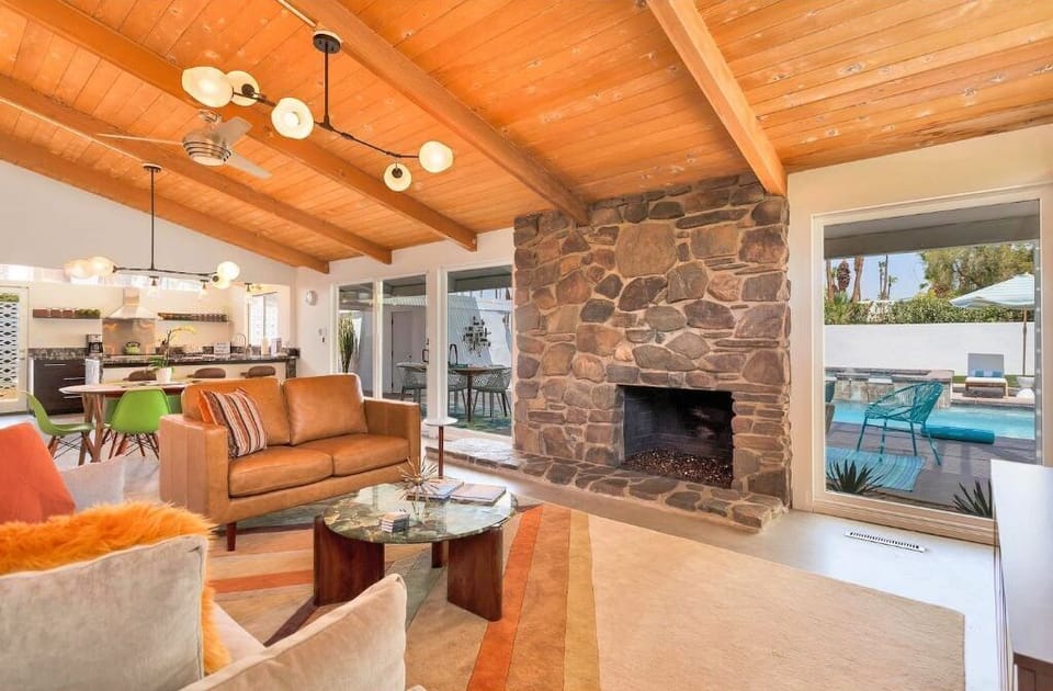 Great room with polished concrete floors and a gas fireplace