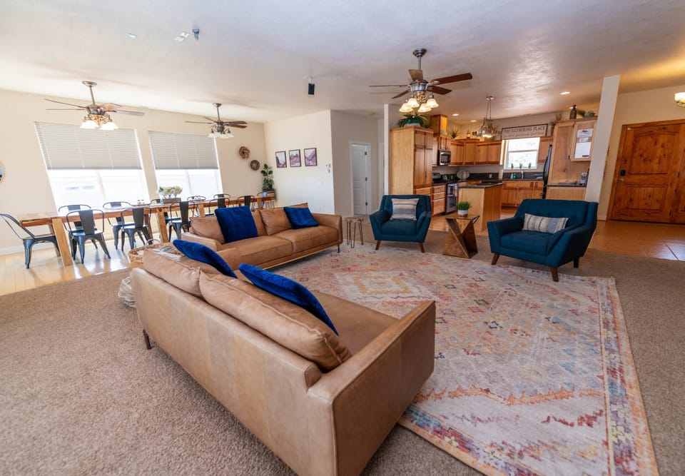 Designed for togetherness, the open floor plan seamlessly blends the living, dining, and kitchen areas, allowing for easy conversation and interaction no matter where you are.