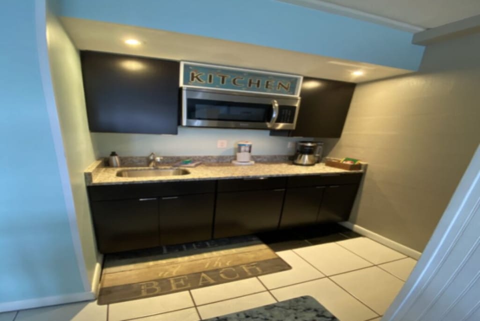 Kitchenette with Granite Counter Top, Microwave, & Refrigerator/Freezer