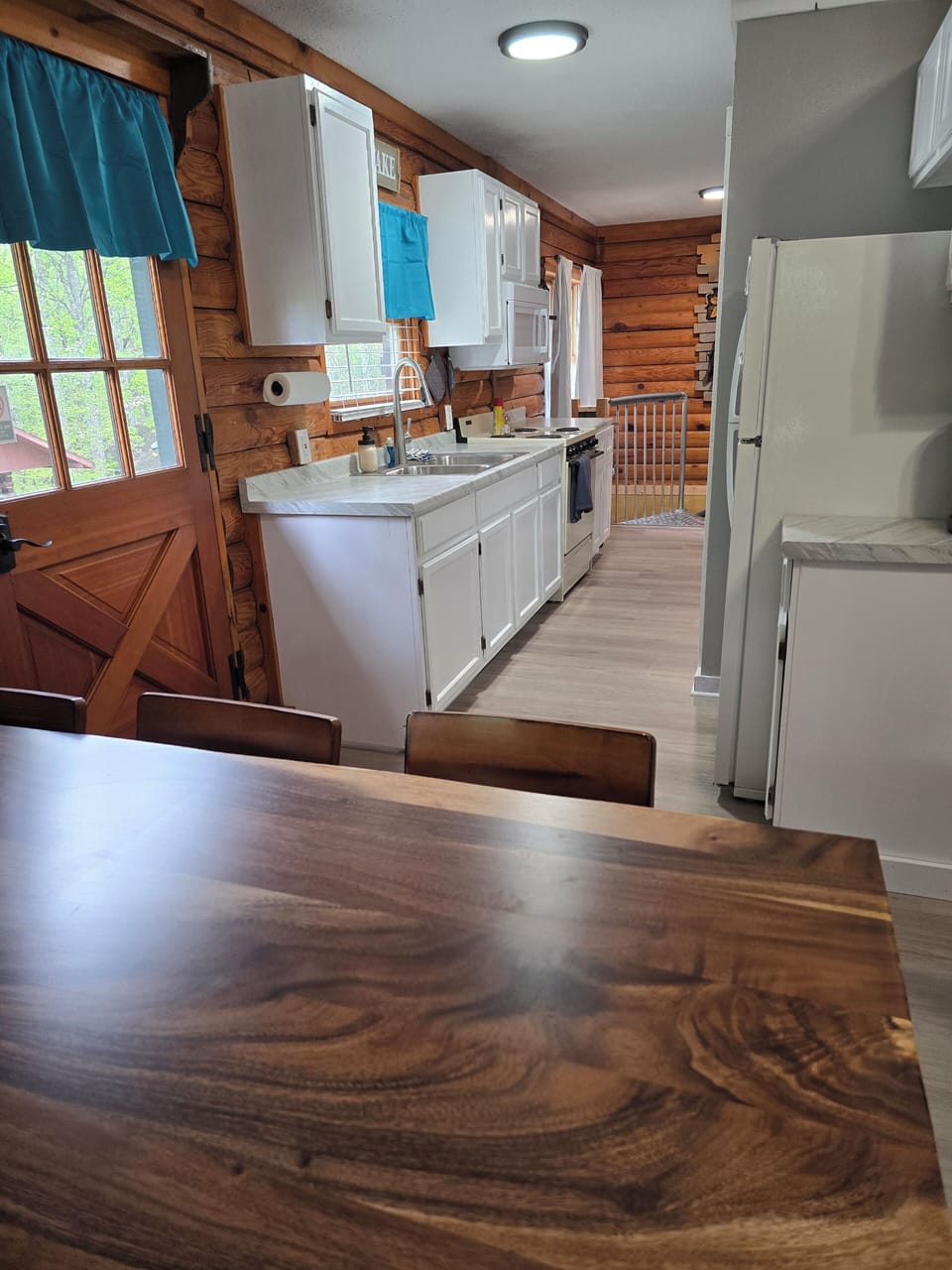 Looking into the kitchen from the table. 