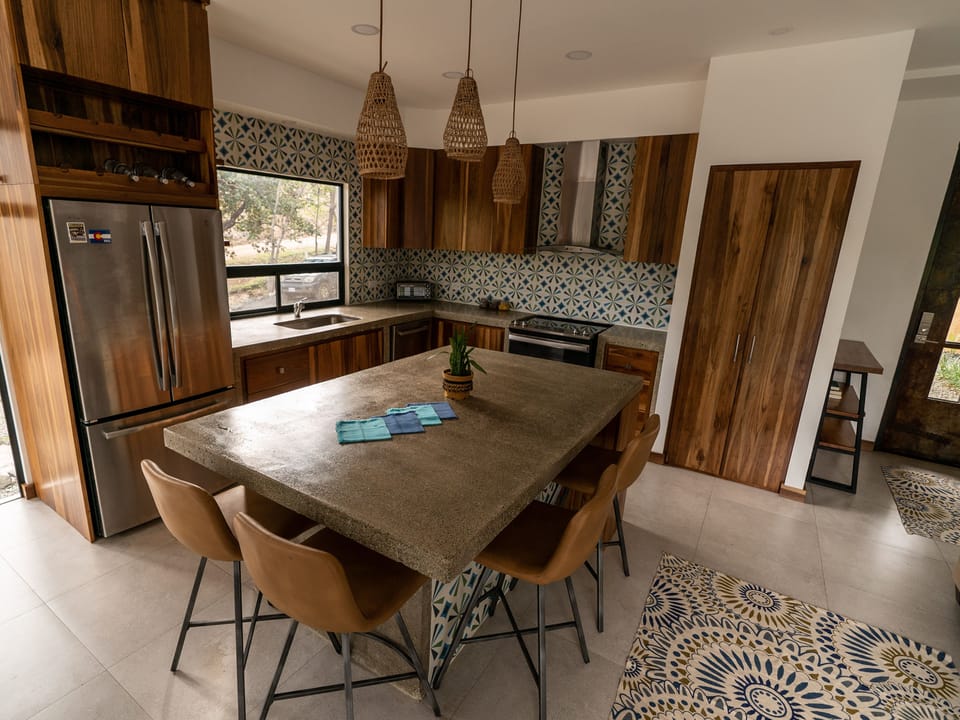 Kitchen is stocked with everything you need to make this your temporary home.