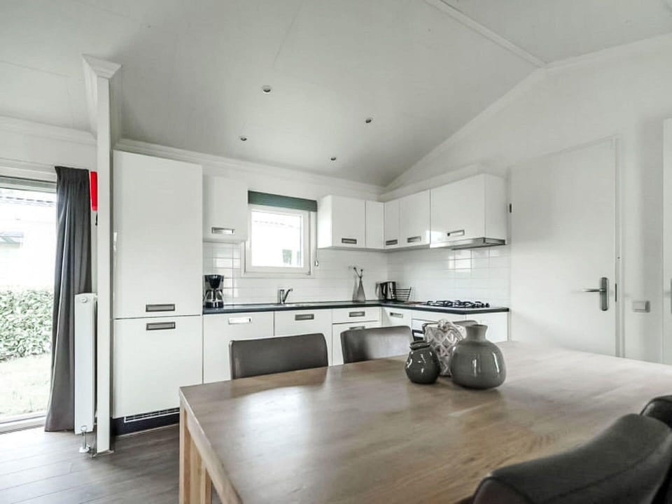 Table, Furniture, Plant, Building, Cabinetry, Window, Interior Design, Wood, Floor, Flooring