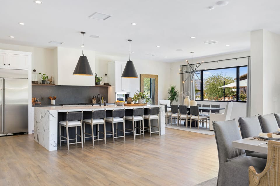 Multiple dining areas and a breakfast bar.