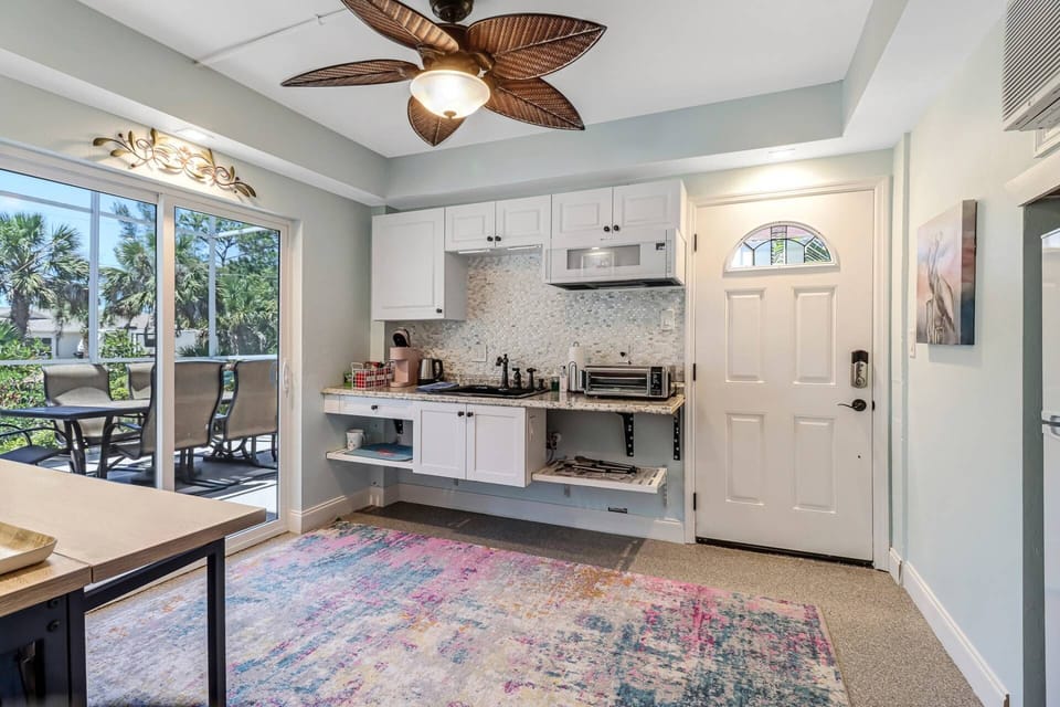 Newly remodeled kitchenette includes kitchen sink, microwave, fridge & air fryer to roast & bake.