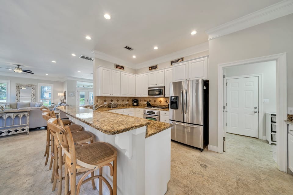 Beautifully updated kitchen with plenty of space to prepare and serve.