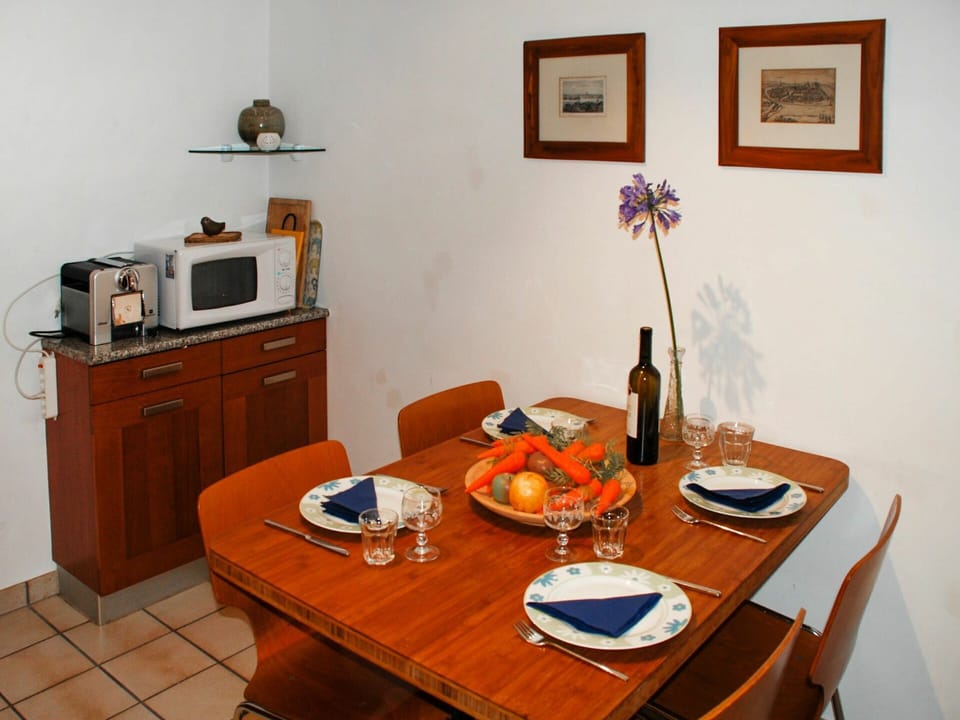 Table, Tableware, Furniture, Property, Picture Frame, Food, Bottle, Cabinetry, Dishware, Chair