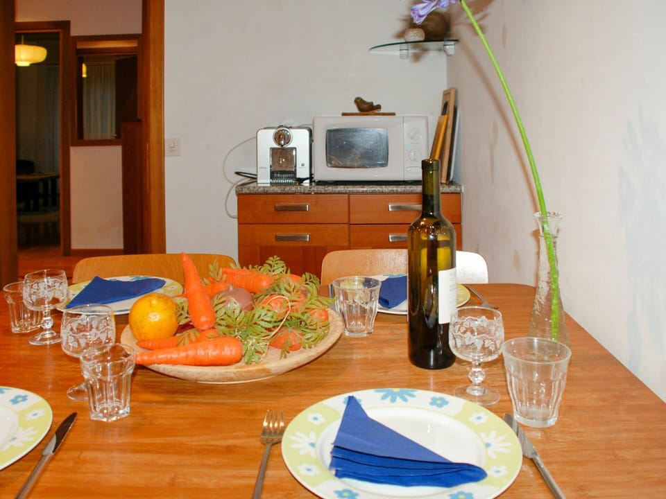Food, Table, Tableware, Furniture, Cabinetry, Dishware, Plate, Orange, Chair, Wood