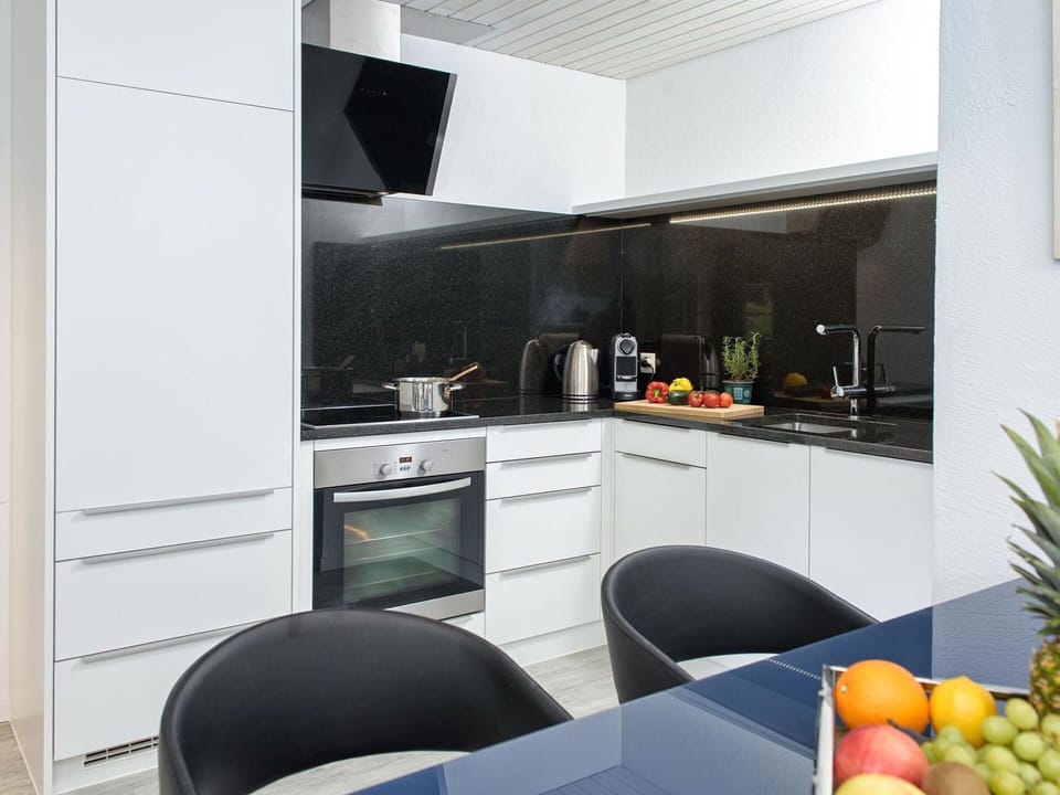Property, Cabinetry, Building, Plant, Kitchen Appliance, Countertop, Kitchen Stove, Interior Design, Chair, Floor