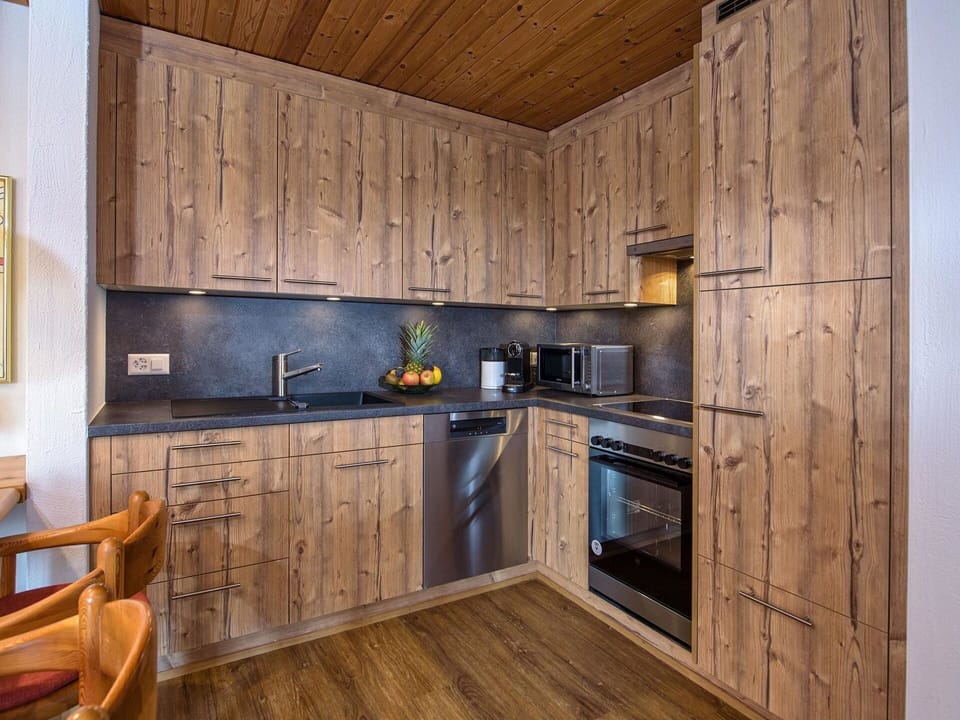 Cabinetry, Countertop, Kitchen, Kitchen Stove, Wood, Kitchen Appliance, Interior Design, Flooring, Floor, Wood Stain