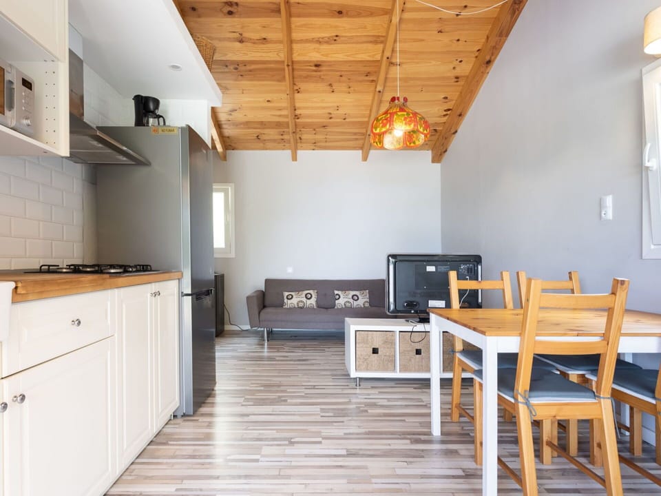 Furniture, Cabinetry, Property, Countertop, Wood, Table, Kitchen Stove, Interior Design, Architecture, Flooring