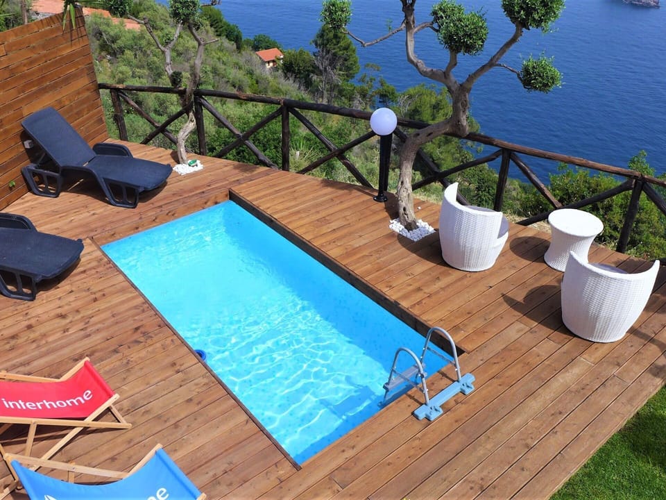 Water, Plant, Furniture, Swimming Pool, Blue, Building, Green, Azure, Outdoor Furniture, Wood