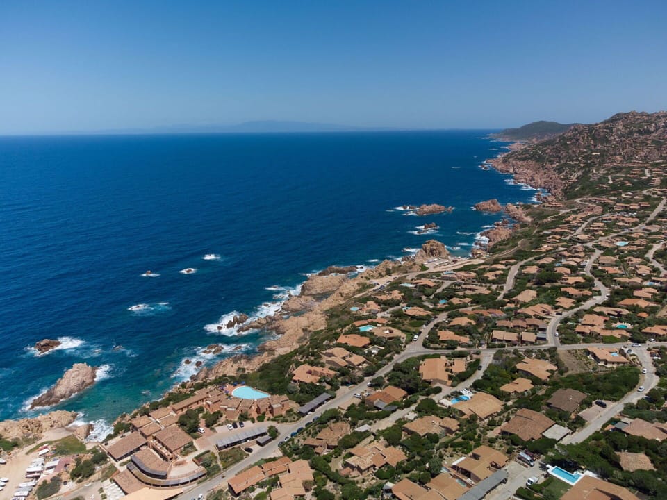 Water, Sky, Property, Blue, Azure, Coastal And Oceanic Landforms, Beach, Building, Landscape, Tree