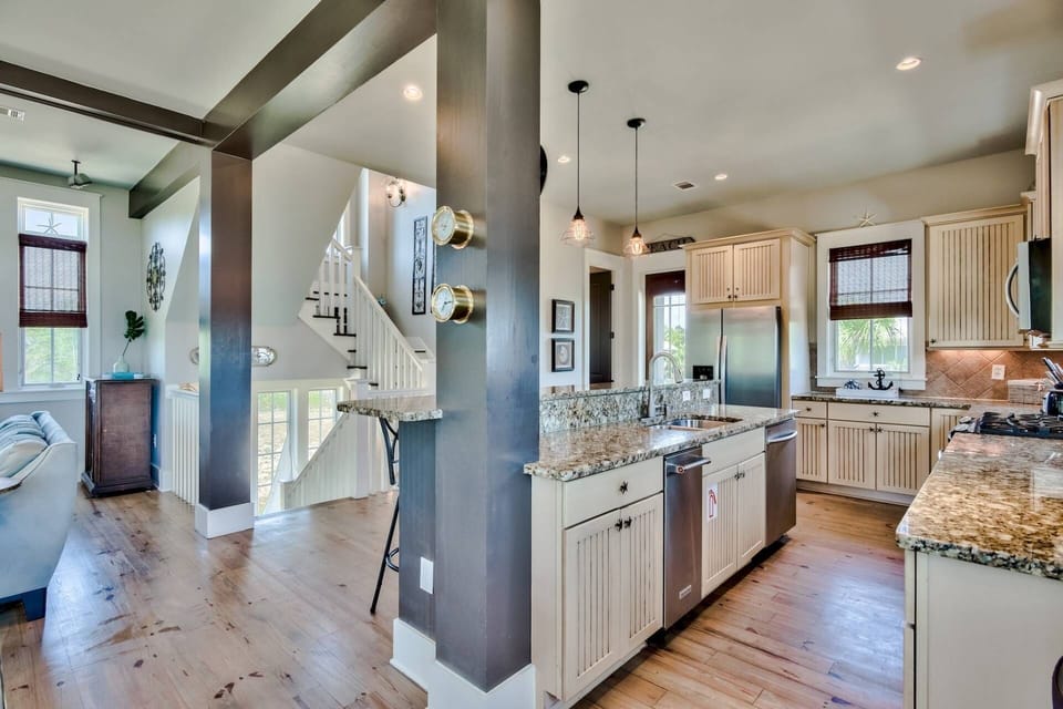 Spacious open concept living area drenched in natural light - 2nd floor