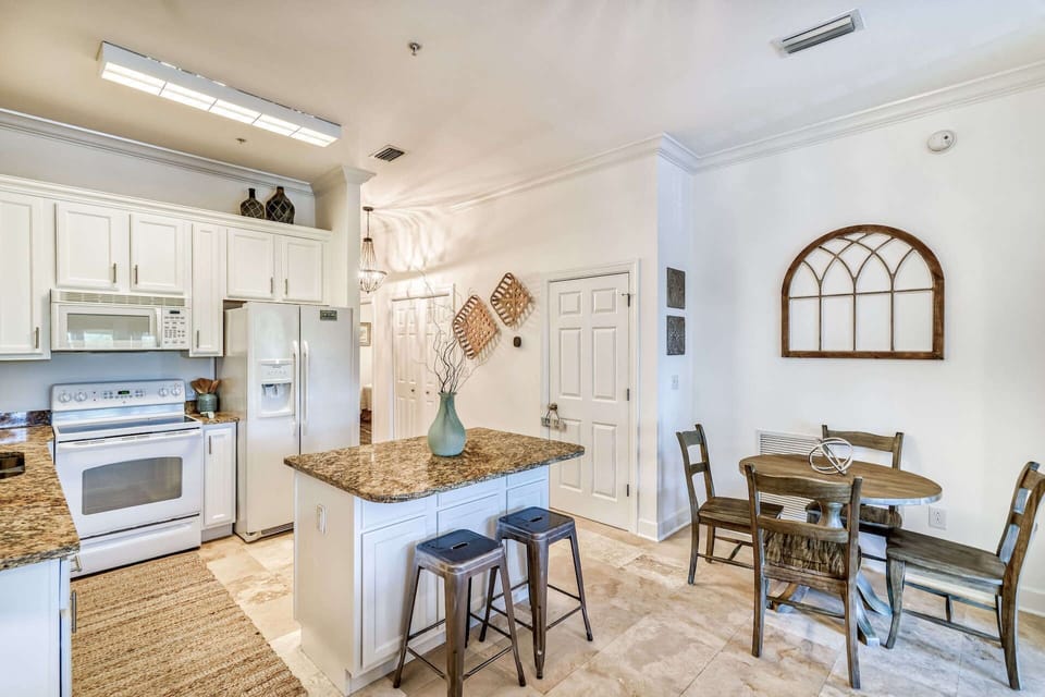 Bar seating for 2 features in the full kitchen