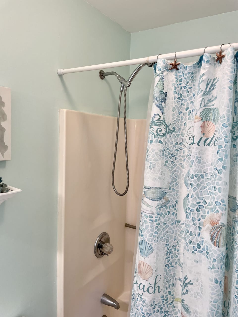 Primary shower with handheld showerhead.