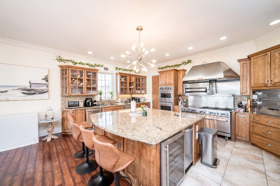 Large commercial kitchen with many amenities for any chef!