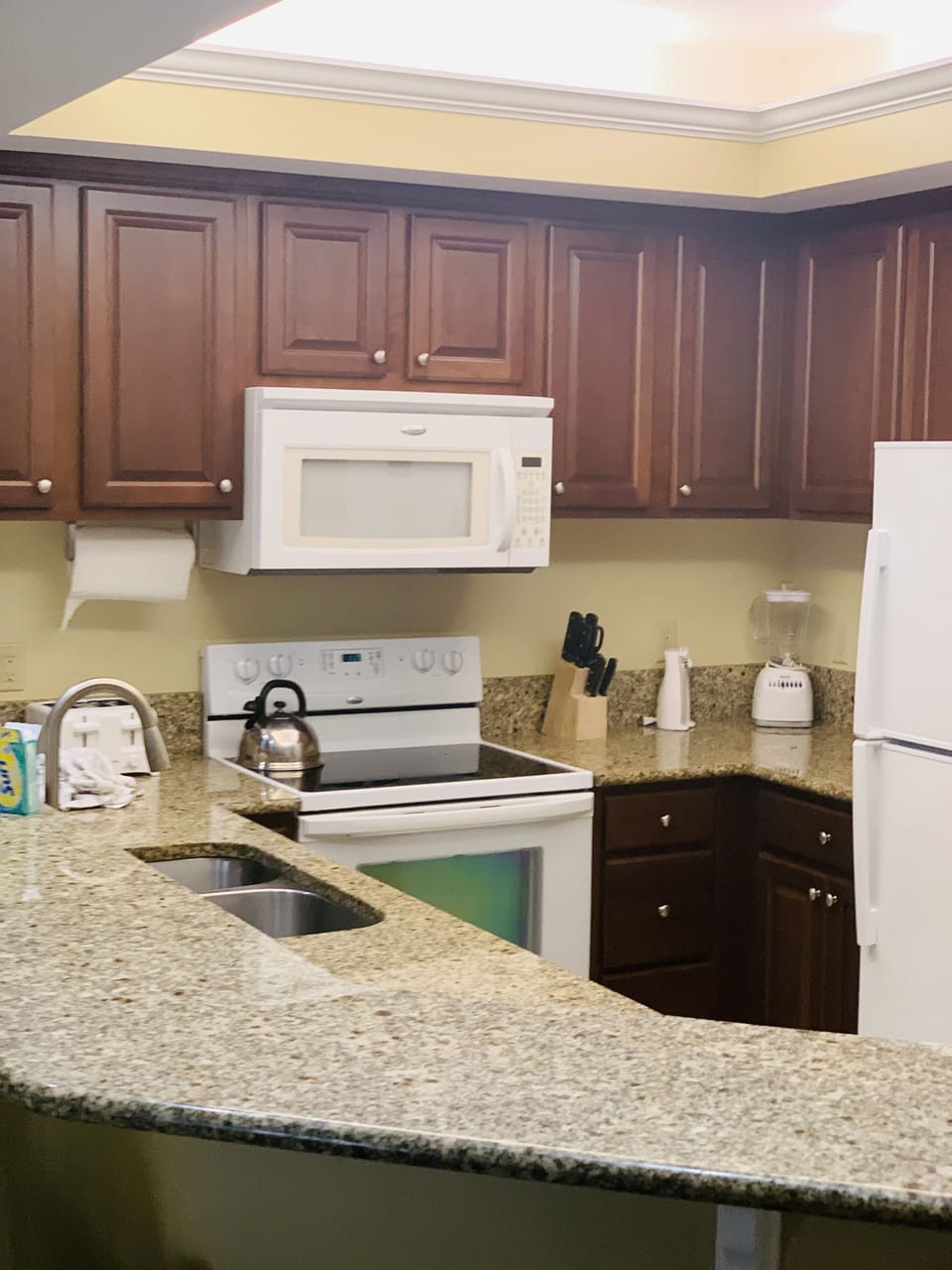 Kitchen - showing toaster, tea kettle, knives block, can opener and blender