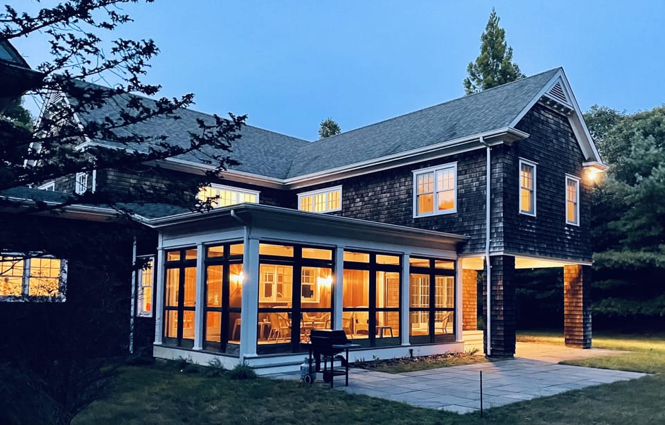 Rear of house, screened in porch, patio lawn, outdoor grill