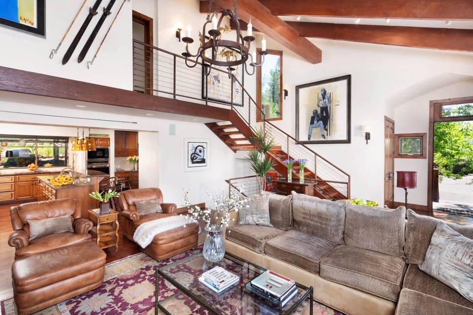 One king bedroom is located upstairs from the inviting living area.