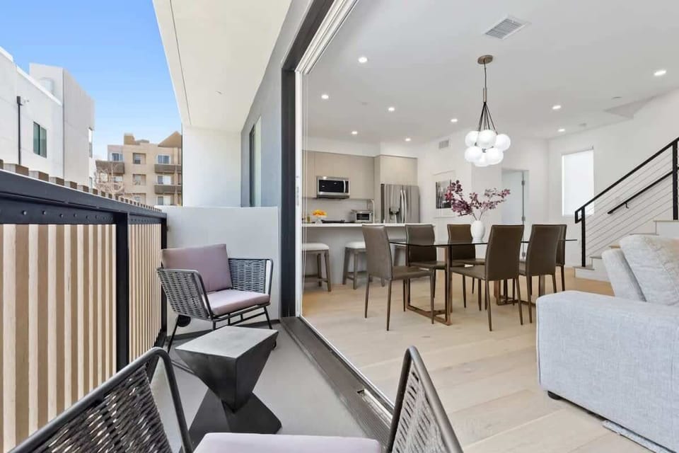 Balcony Space with comfortable seating and plenty of sunlight.
