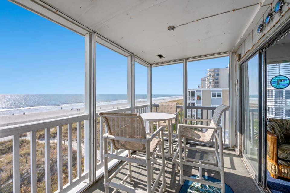 Have breakfast and coffee on the oceanfront porch.