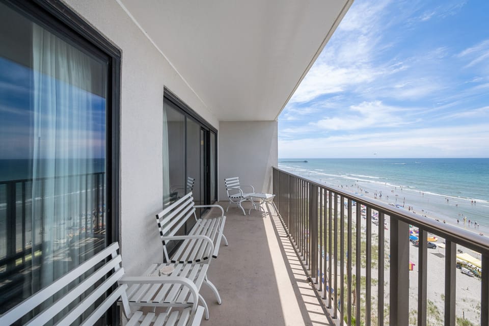 Sit down with your favorite drink while watching the waves.