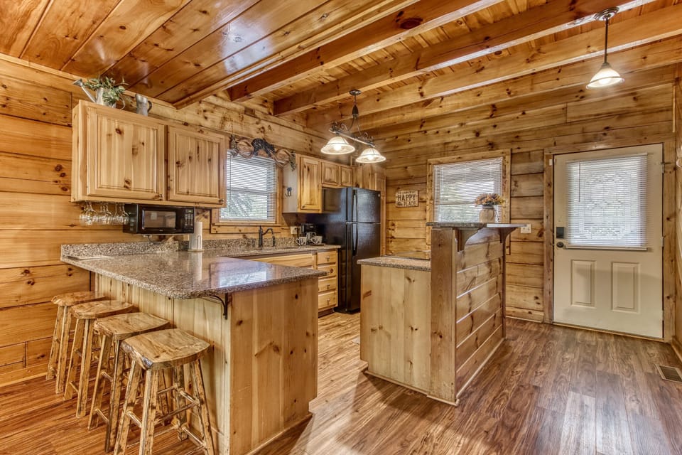 Enjoy cooking in this well stocked kitchen. 