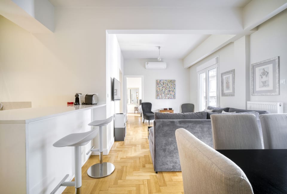 Bar counter by kitchen also acts as alternative home office work space