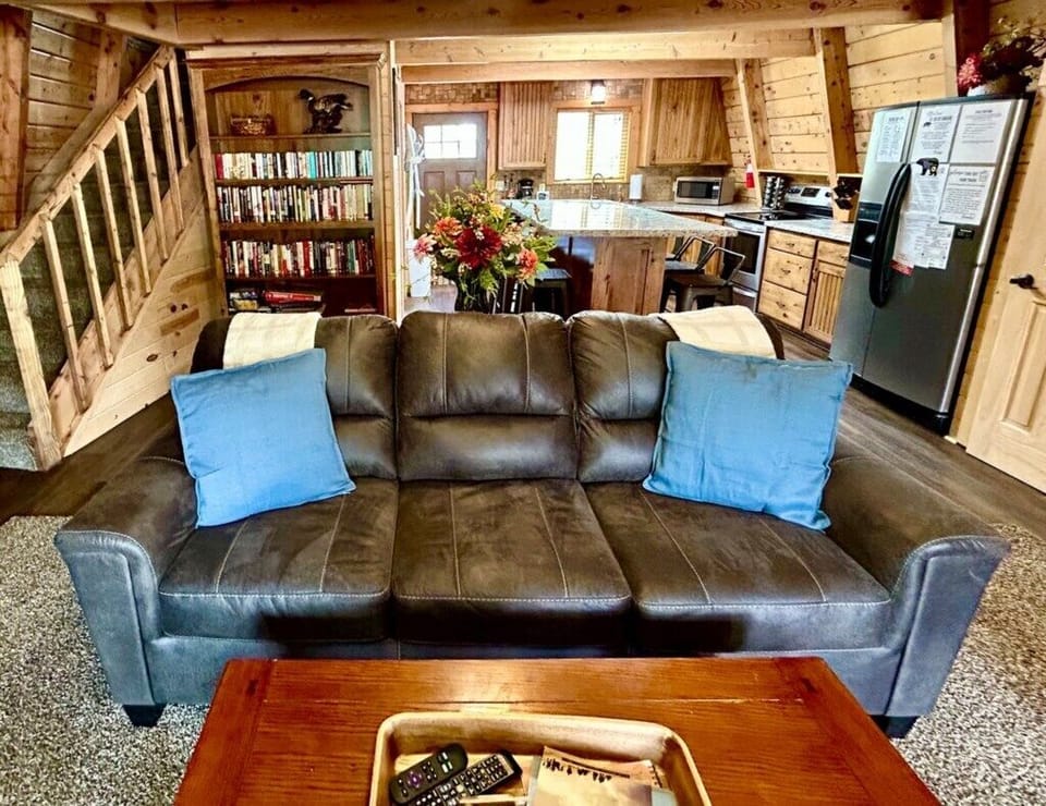In this space guests can enjoy the open concept kitchen/living room with gas fireplace. 
