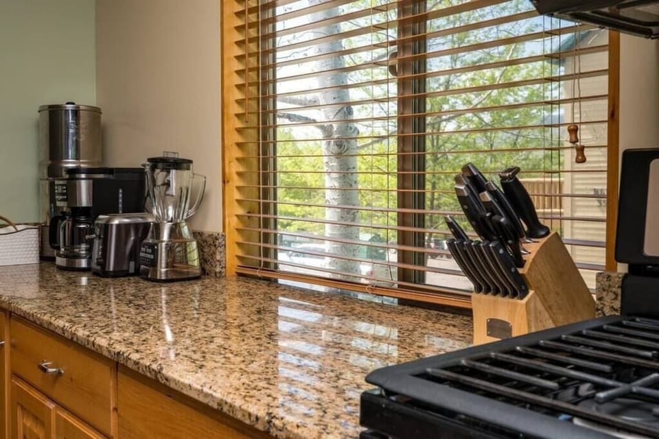 Cook your favorite meals in a kitchen bathed in natural light that enhance the culinary experience.