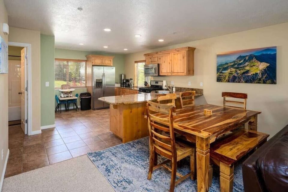 Experience seamless communication with friends and guests in the open-concept floor plan.