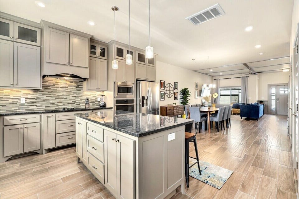 This custom kitchen is a dream, with high end appliances and luxury finishes.