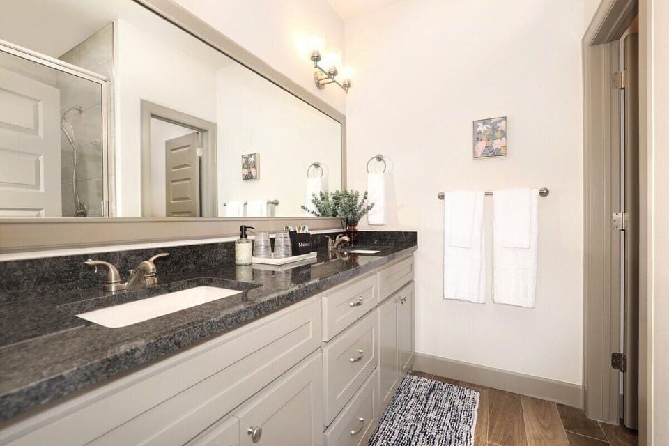 The en suite master bath features a walk-in shower and spacious closet.