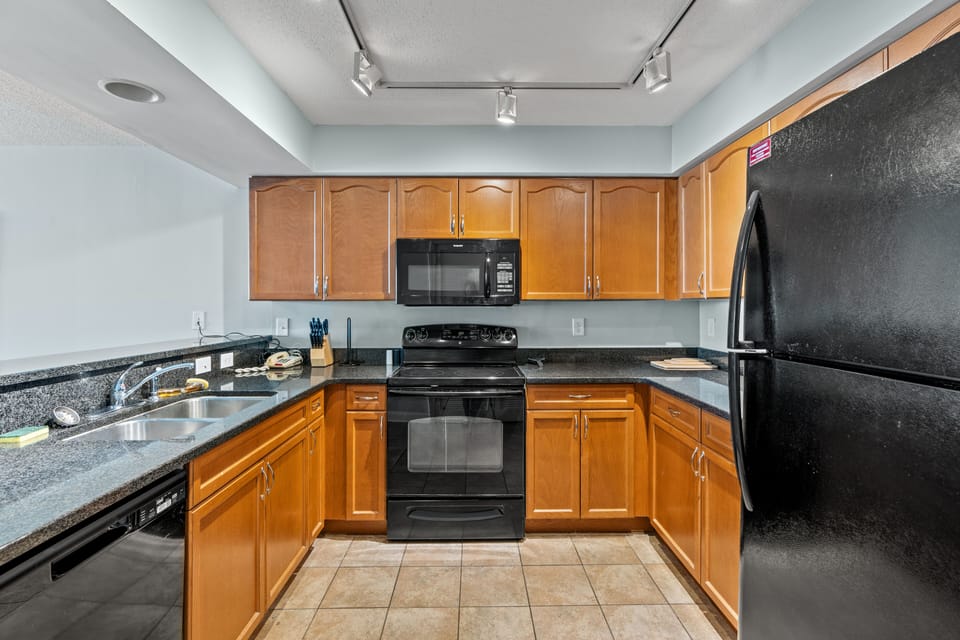 The family chef will love this spacious kitchen complete with a huge workspace.