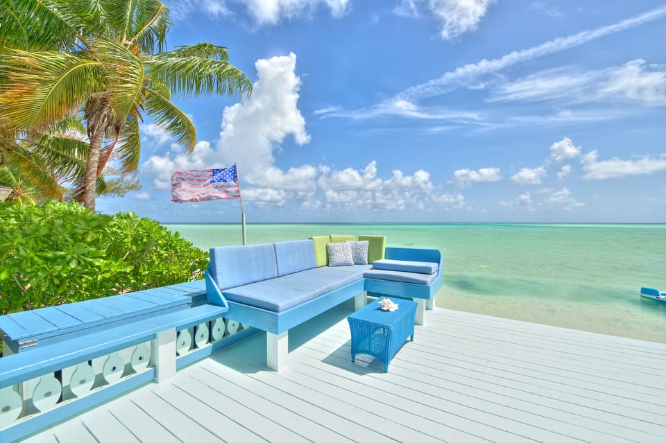 Back Patio steps to beach and ocean.